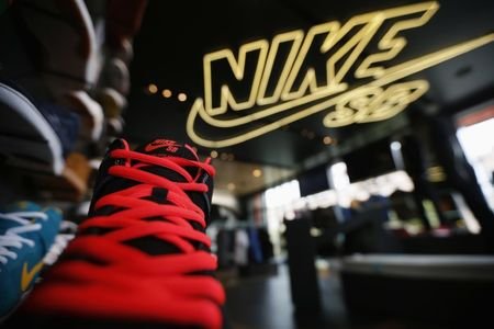 Nike Shares Jump 2% After Apple CEO’s Strategic Investment